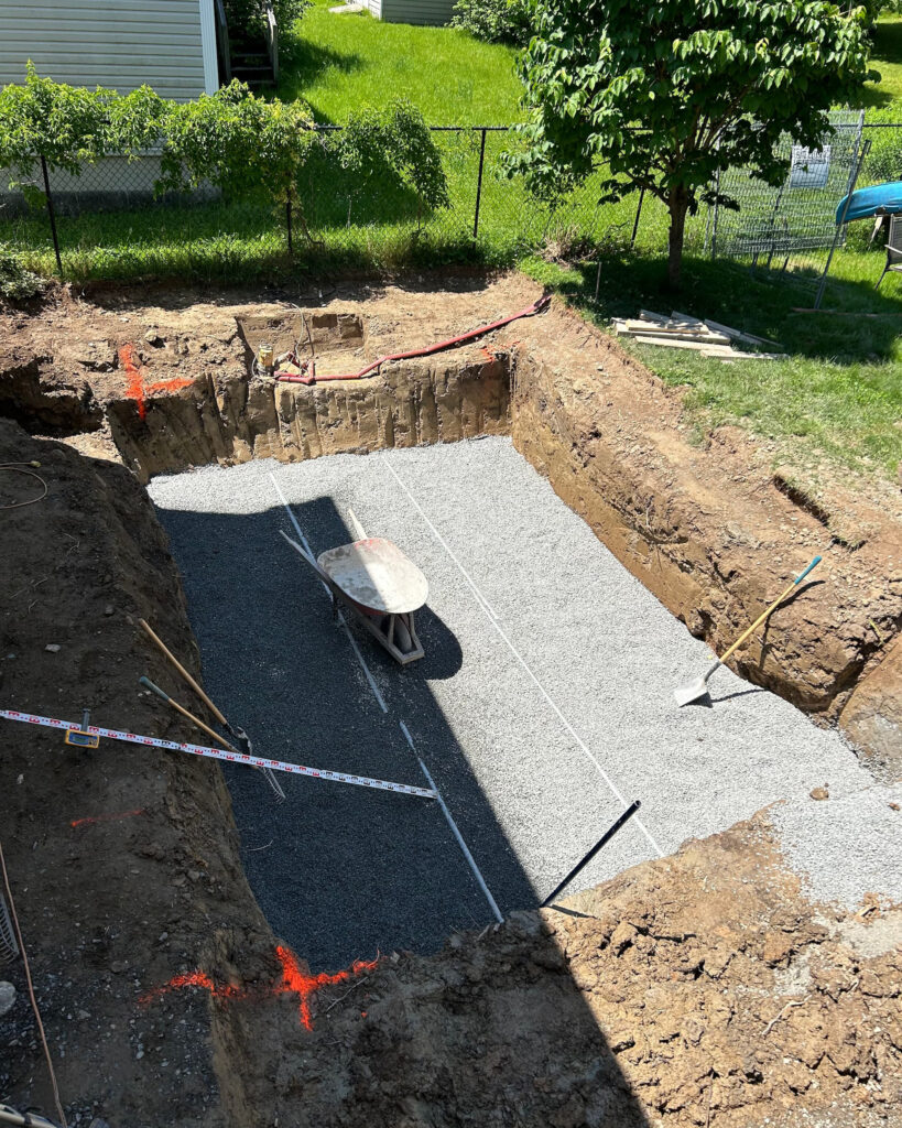 a pit dug ready for a fibreglass pool to be placed.